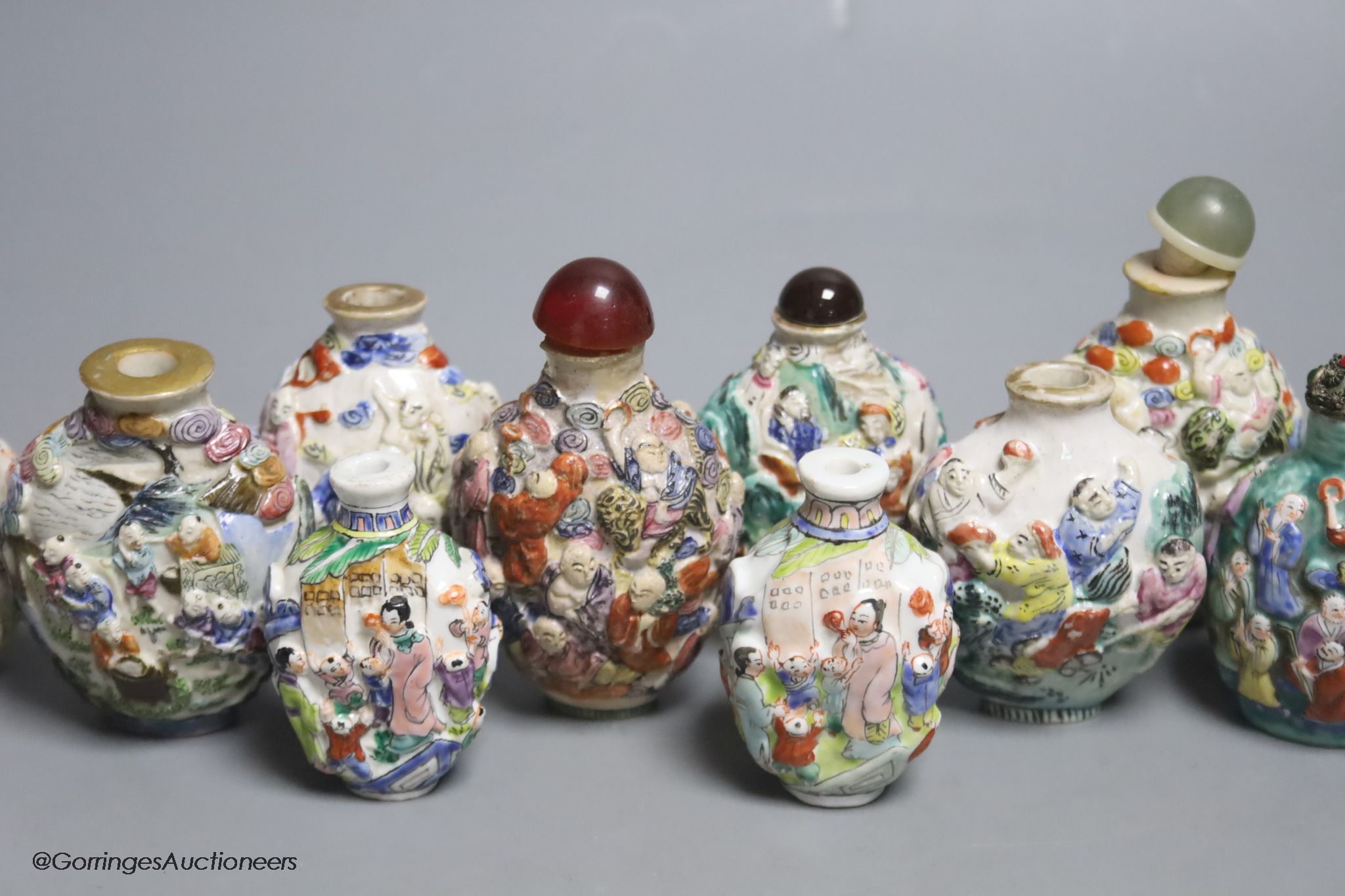 A collection of Chinese twelve famille rose snuff bottles